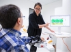 Dr Jooeun Song demonstrates Tyromotion robotic reh